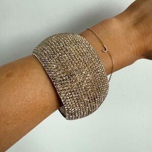 Large gold rhinestone encrusted statement bangle bracelet